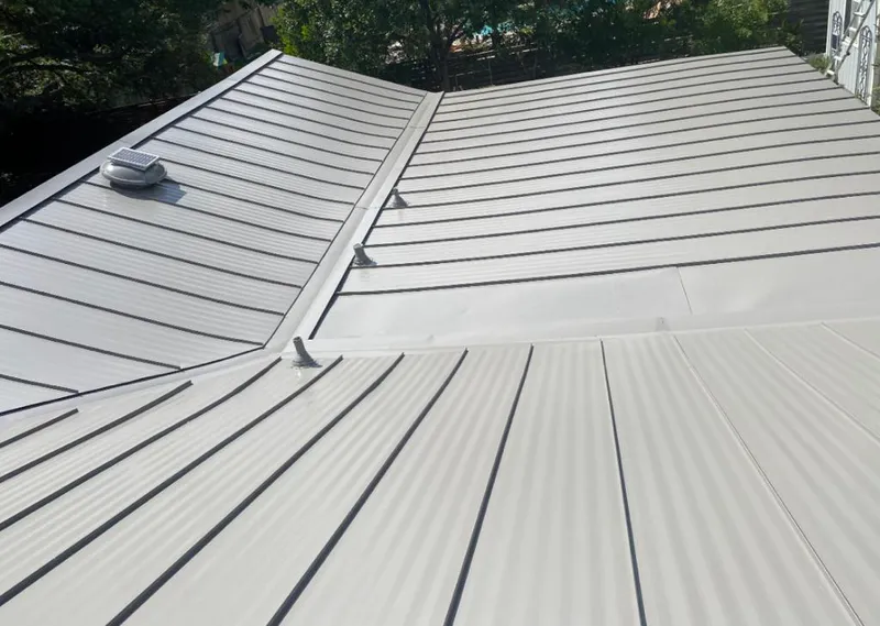 Solar attic fan installed on a metal roof for Roof Ventilation in Walla Walla